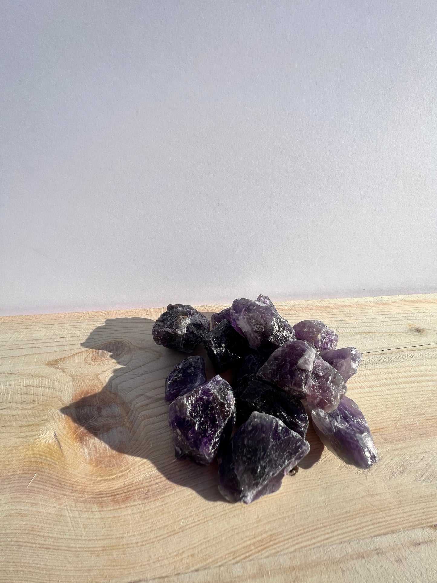 A variety of raw amethyst stones.