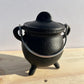 A black potbelly cauldron