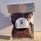 1/2 ounce bag of rose buds with label.