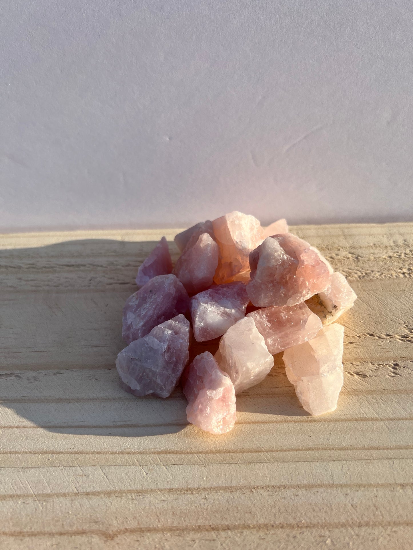 Raw rose quartz in the sun.